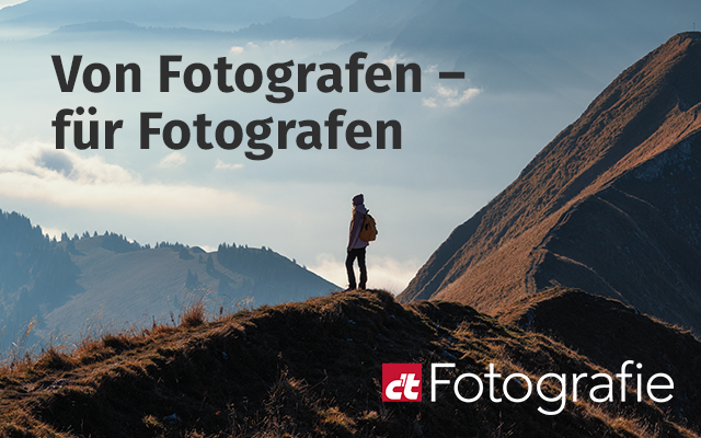 Header für c't Fotografie. Ein schönes Landschaftsmotiv mit Bergen und einer Person.